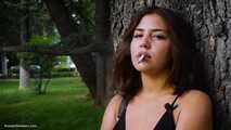 Good smoker Elmira is chain smoking all white 120mm cigarettes