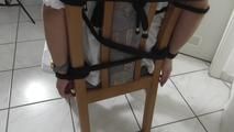 Mystique roped on chair 2/2