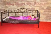 Mara tied and gagged on a princess bed in an old cellar wearing an supersexy thin shiny nylon combination (Pics)