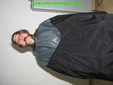 Get 328 Pictures with Katharina tied and gagged in shiny nylon rainwear from 2005-2008!