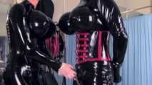 Mistress Tokyo - Heavy rubber Mistress with slave in hard metal bondage