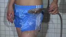 SEXY SANDRA in the shower with a sexy lightblue shiny nylon shorts and a top (Video)