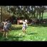 Jill and a friend of her playing soccer in the garden while wearing shiny nylon shorts (Video)