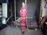 Watch Sandra bound gagged and noosed wearing her shiny nylon Rainwear