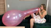 Blow2Pops custom red Longneck balloon in bra