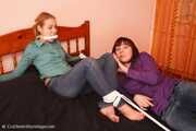 Catt and Alexa - Naughty girl tied up before joining helpless girlfriend on the bed