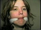 18 year old Heather IS MOUTH STUFFED, CLEAVE GAGGED, BLINDFOLDED, NYLON STOCKING GAGGED, TAPE GAGGED AND HANDGAGGED (D55-10)