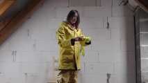 Miss J ziptied and gagged in3 layers of raingear, hard gagged and hooded