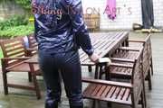 SEXY ***COURTNEY*** wearing a sexy darkblue rainwear combination while drying the partio furniture  (Pics)
