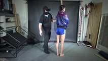 New Model Myxxxy bound in heavy Iron cuffs and gagged with her own Panty