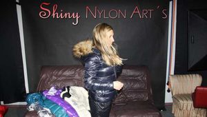 Watching sexy Sandra wearing a sexy shiny nylon black catsuit and trying on several down jackets (Pics)