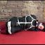 Jill tied, gagged and hooded lying on the floor wearing sexy shiny nylon black rainwear (Video)