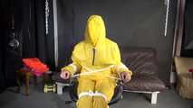 Sandra being tied and gagged on a hairdresser´s chair wearing sexy yellow shiny nylon rainwear being double hooded (Video)