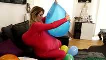 popping balloons and blow2pops in a stuffed unitard
