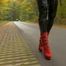 Black gloss leggings and red boots