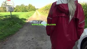 Watch Chloe taking a walk with her shiny nylon Rainwear