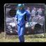 Mara wearing a blue rainwear combination while playing soccer with herself (Video)