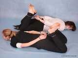 Alexa and Catt - Sweet blonde demonstrates her tied up friend how to use cuffs