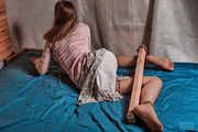 Sexual spreaded legs with jute and wood in pink clothes
