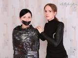 [From archive] Marvita is wrapped in black cling film by Chantelle