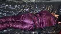 Watching Lucy preparing her sofa with a black shiny nylon cloth for lolling with a sexy purple downsuit on the sofa (Video)