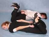 Alexa and Catt - Sweet blonde demonstrates her tied up friend how to use cuffs