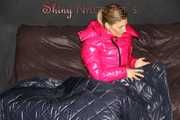 Watching sexy Sandra wearing a sexy pink shiny nylon rain pants and a pink down jacket nestle down in a down cover (Pics)