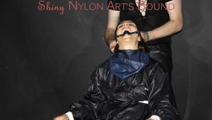 Watching our new model "AIYANA" wearing sexy shiny nylon rainwear being bound with tape, gagged with a ballgag, dominated and hooded from Dark Temptation (Pics)