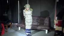 Sexy Sandra being tied and gagged and hooded with ropes and a ballgag overhead wearing sexy rainwear and rubber boots  (Video)