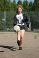 Leonie playing soccer outdoor wearing a sexy black shiny nylon shorts and a sexy black rain jacket (Pics)