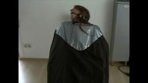 3sets of short videos with Katharina tied and gagged and hooded on a chair wearing shiny nylon rainwear (Video)