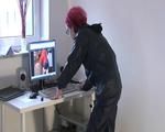 Marlin doing PC work wearing a hot rainwear combination (Video)