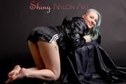 Mara wearing a sexy black shiny nylon shorts and a black rain jacket posing for you (Pics)