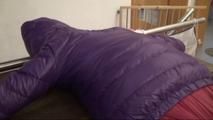 Alina tied and gagged on a commode wearing a shiny red/purple downwear combination (Video)
