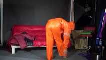 Watching sexy Pia putting on an orange AGUlike rainwear combination feeling comfortable in it and posing for you (Video)