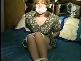28 YEAR OLD HOUSEWIFE IS HANDGAGGED AND F0RCED TO TIE, GAG & HANDCUFF HERSELF ON THE BED pt 1 (D60-9)