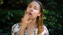 Evgeniya is smoking strong 120mm cigarette