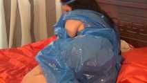 [From archive] Elsa - hogtaped in trash bag dress (video)