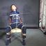 Marie bound and gagged in shiny nylon Rainwear