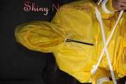 Sandra being tied and gagged on a hairdresser´s chair wearing sexy yellow shiny nylon rainwear being double hooded (Pics)