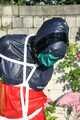 Watch Sandra bound, gagged and pantyhooded in her shiny nylon Rainwear