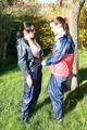 Jill and her friend in the garden playing with eachother wearing sexy shiny nylon rainwear (Pics)