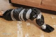 [From archive] Iren packed in trash bag (3)