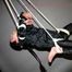 Archive girl tied, gagged and hung wearing a shiny black rainsuit (Pics)