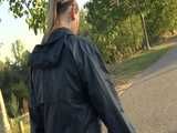 Get a Video with Sandra walking in her shiny nylon Rainsuit at a very hot and sunny day