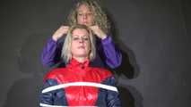 Watzching sexy PIA wearing a sexy oldschool rainwear combination in red/blue sitting on a hairdresser´s chair being tied and gagged from Sophie (Video)