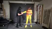 Marie M in a customer wish video handcuffed in Rainwear and a lifevest.