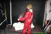 Watch Pia enjoying her shiny nylon Oldschool Rainwear in her shiny nylon Bedsheets