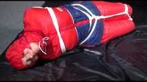 ***SANDRA*** tied and gagged with ropes on the floor wearing a supersexy oldschool down suit (Video)