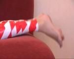 [From archive] Marvita mummified in red and white duct tape (video)